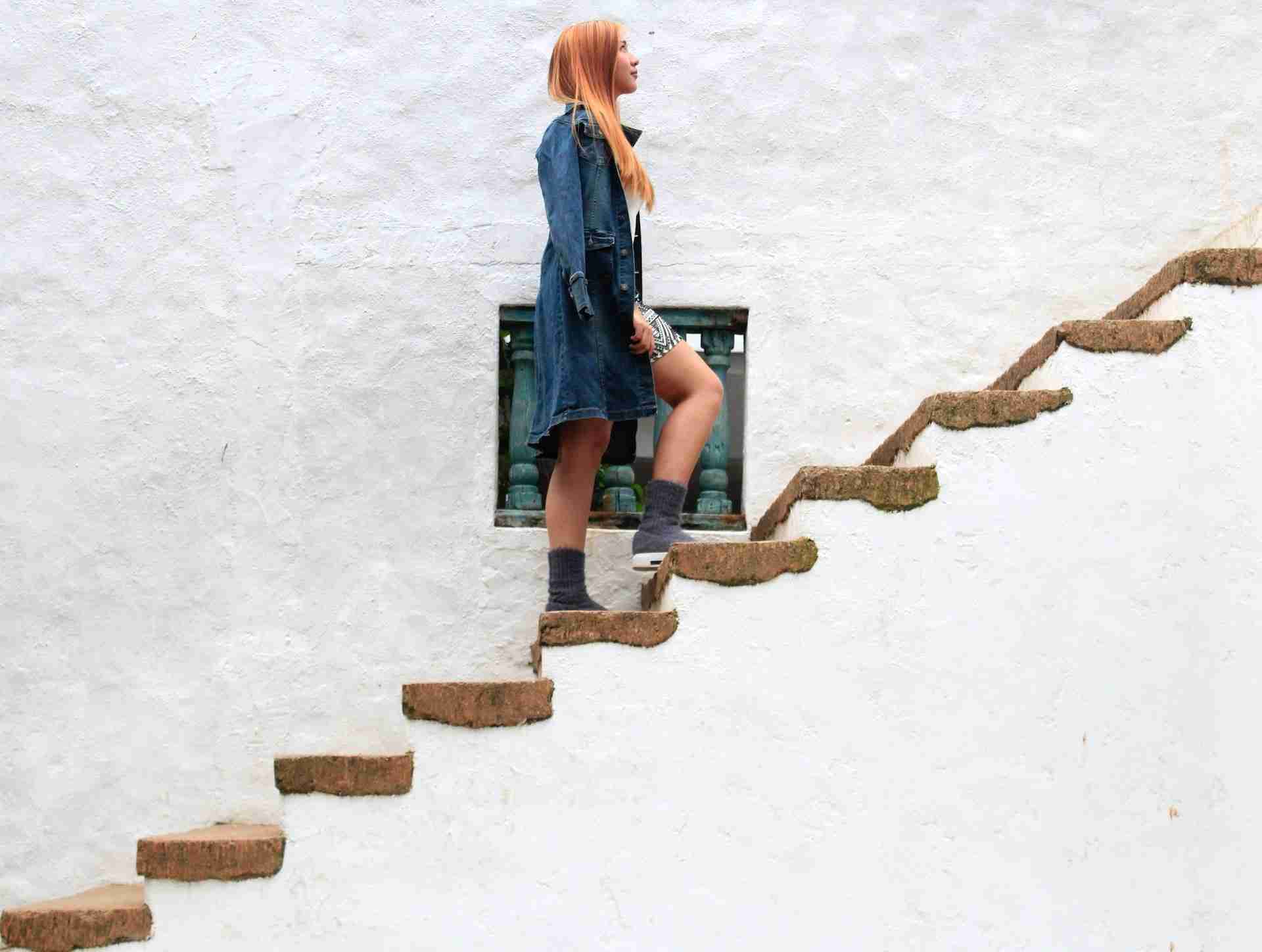 Person walking up stairs as a representation of scalability